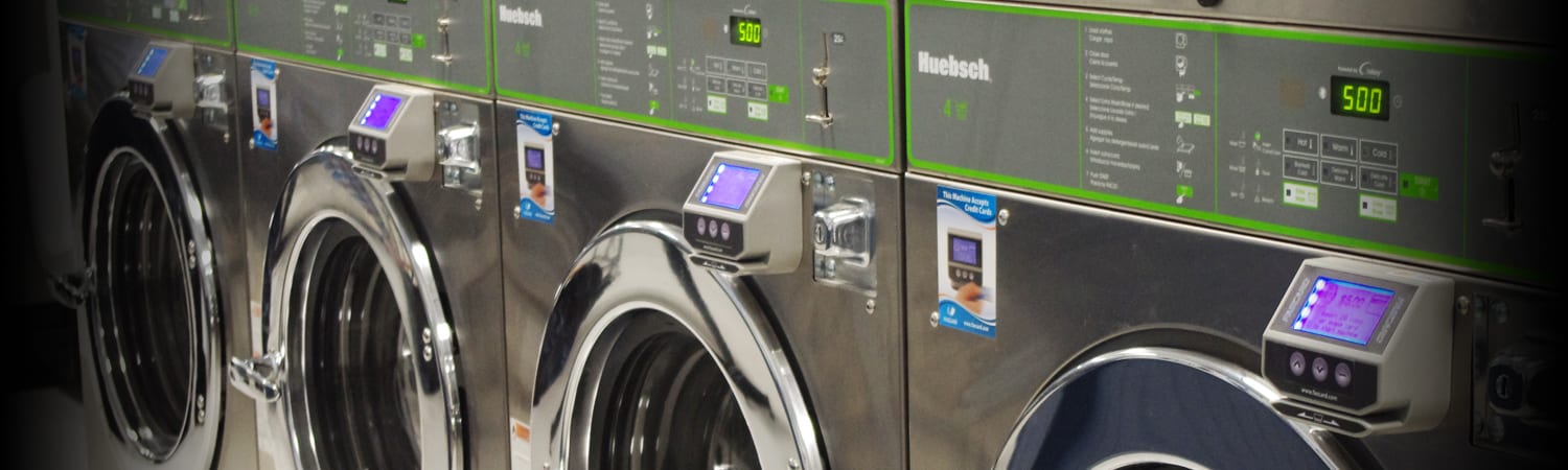 close up of washing machines in a row